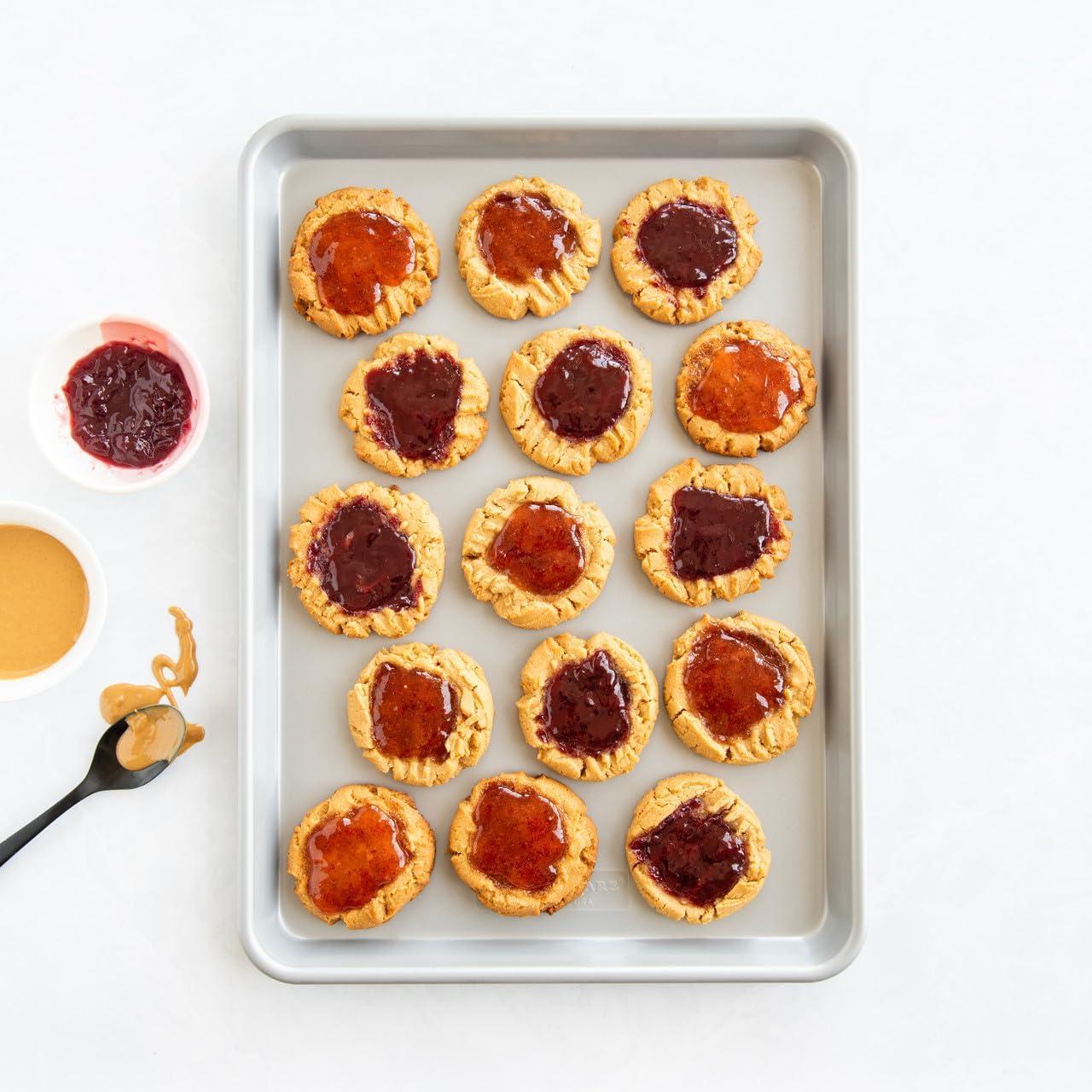 imageNordic Ware Brilliant Colorful Bakeware 12 Cavity Muffin Pan Nonstick made without PFAS or PTFE for safe cooking Reinforced steel rim prevents warping3pc Baking Sheet Set