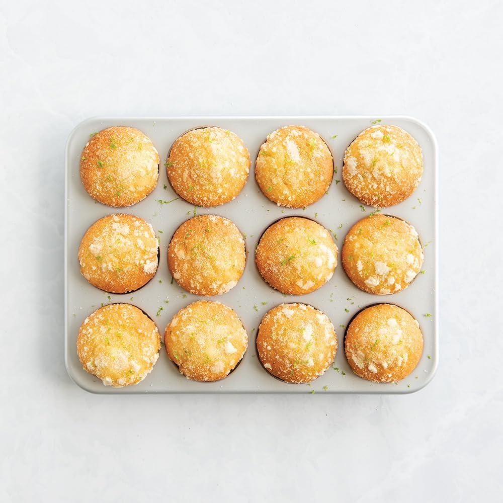 imageNordic Ware Brilliant Colorful Bakeware 12 Cavity Muffin Pan Nonstick made without PFAS or PTFE for safe cooking Reinforced steel rim prevents warpingMuffin Pan