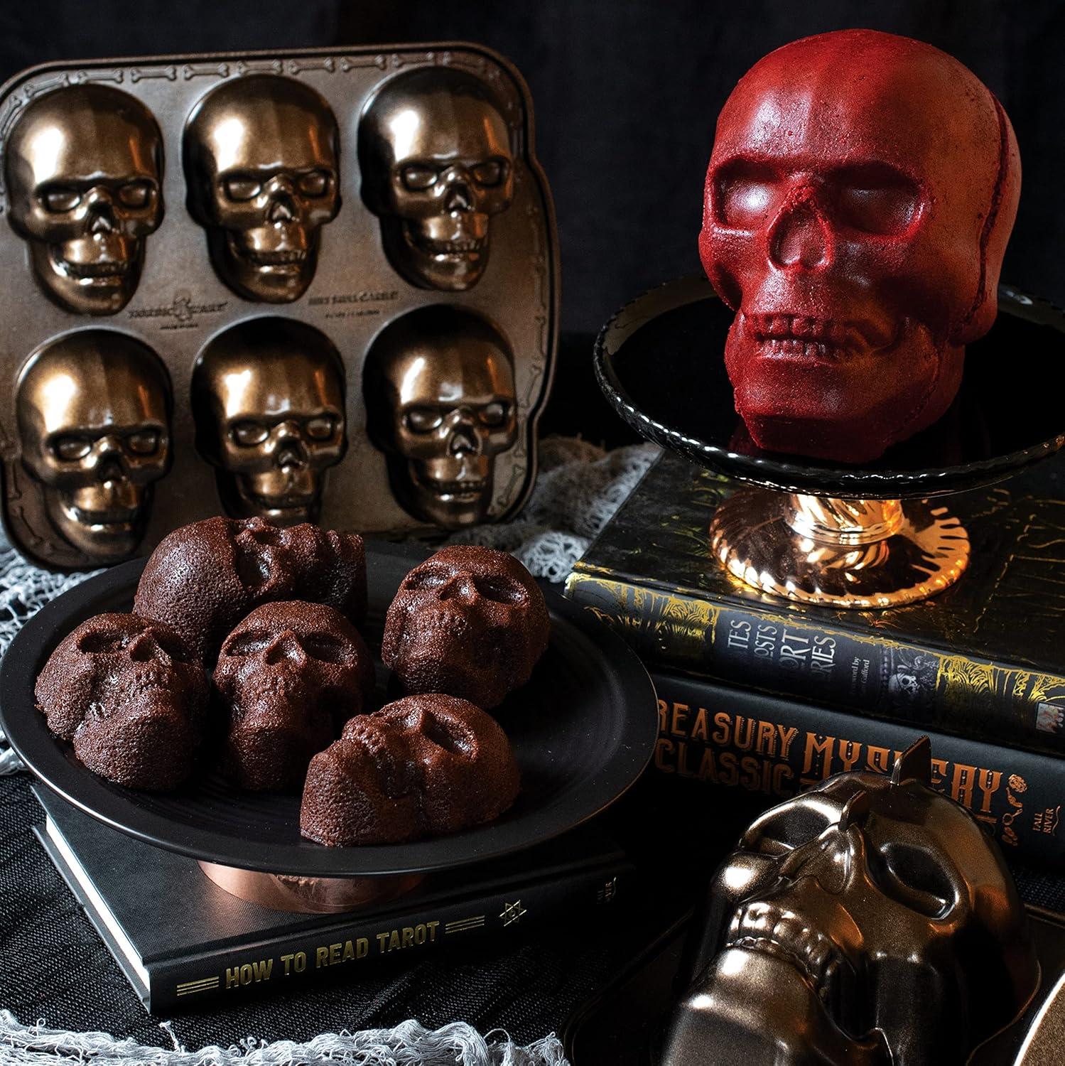 imageNordic Ware Halloween Bakeware Haunted Skull Cakelet Pan Bronze118 x 10 x 2 inches Pack of 3