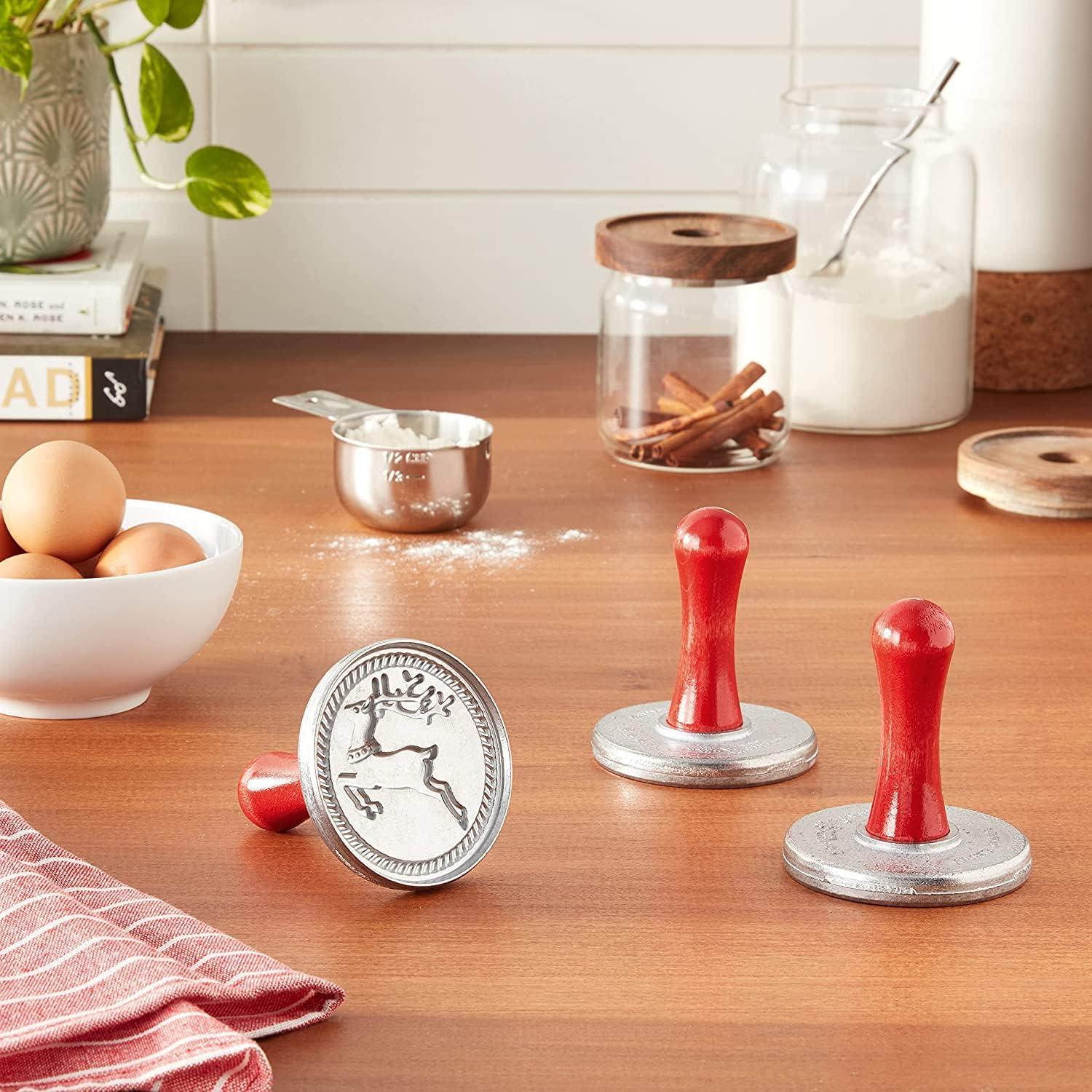 imageNordic Ware Snowflake Cookie Stamps Set of 3 Sturdy Cast Aluminium Cookie Stamp Set Cookie Press Set Made in the USA Sturdy and Durable Biscuit Maker Press Set3inch rounds Pack of 3