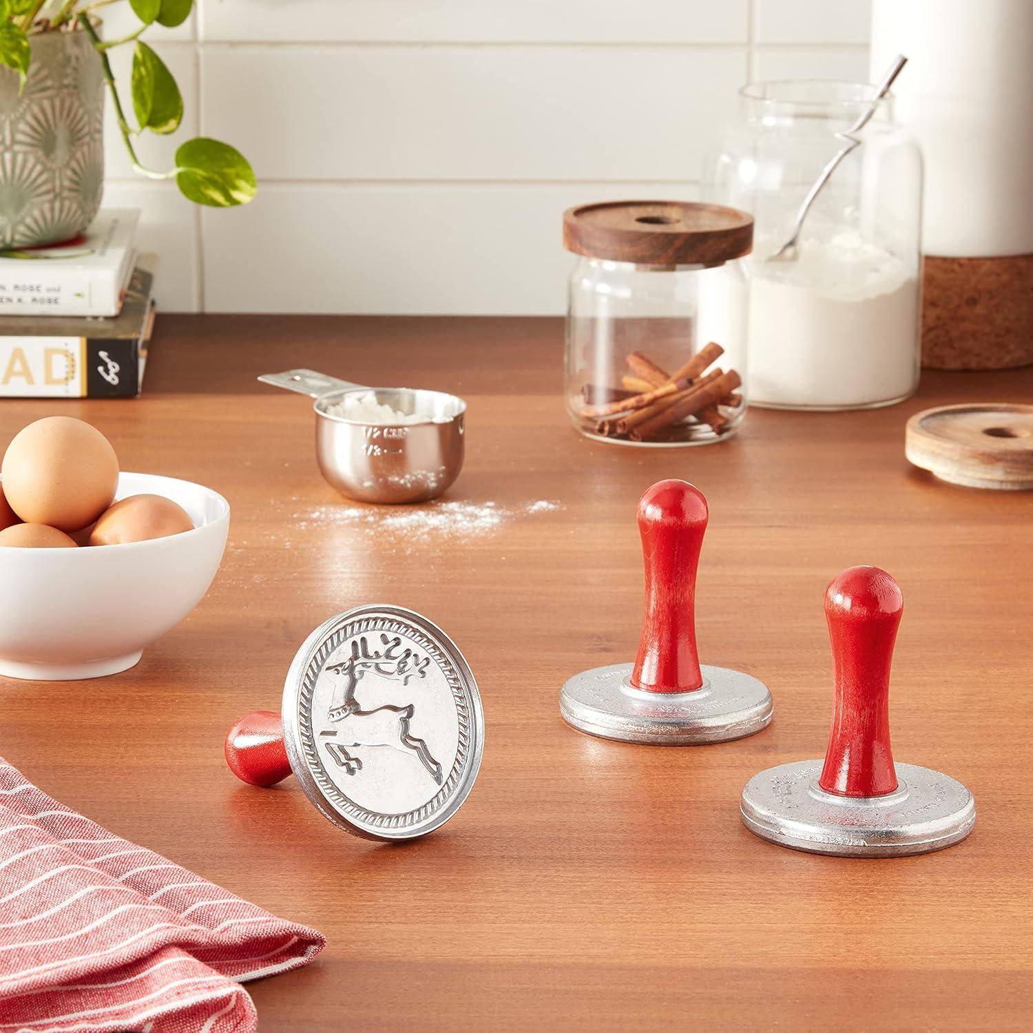 imageNordic Ware Snowflake Cookie Stamps Set of 3 Sturdy Cast Aluminium Cookie Stamp Set Cookie Press Set Made in the USA Sturdy and Durable Biscuit Maker Press Set3inch rounds Pack of 3