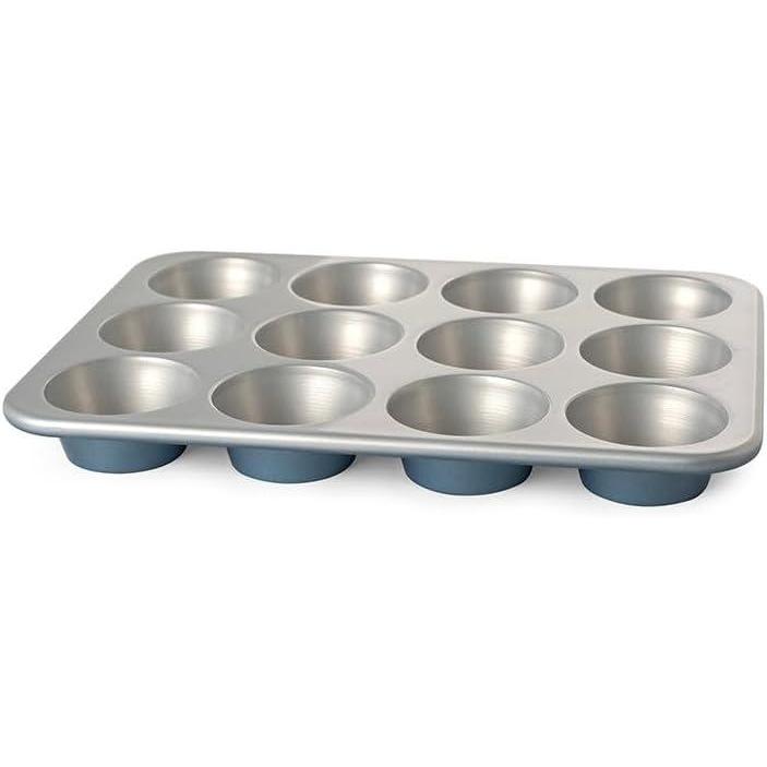 imageNordic Ware Brilliant Colorful Bakeware 12 Cavity Muffin Pan Nonstick made without PFAS or PTFE for safe cooking Reinforced steel rim prevents warpingMuffin Pan