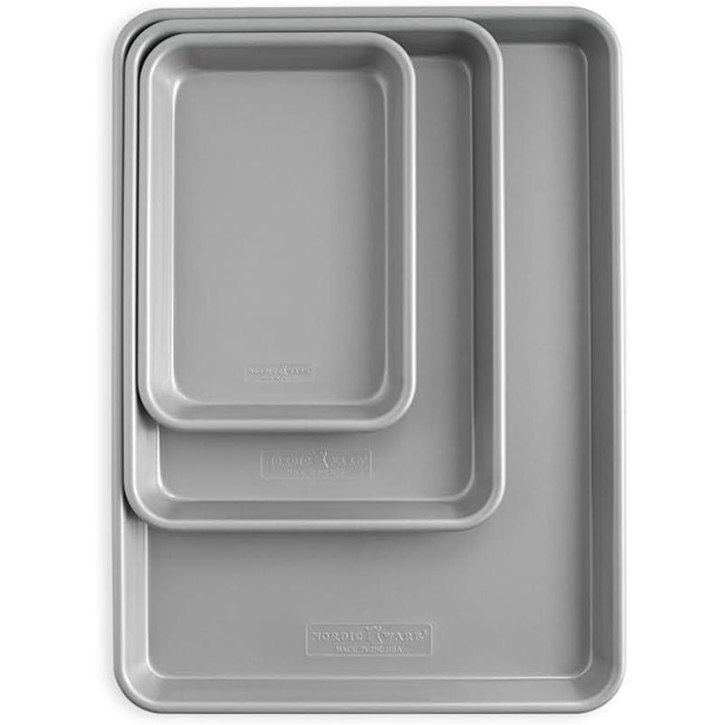 imageNordic Ware Brilliant Colorful Bakeware 12 Cavity Muffin Pan Nonstick made without PFAS or PTFE for safe cooking Reinforced steel rim prevents warping3pc Baking Sheet Set