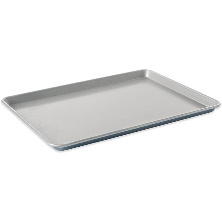 imageNordic Ware Brilliant Colorful Bakeware 12 Cavity Muffin Pan Nonstick made without PFAS or PTFE for safe cooking Reinforced steel rim prevents warpingBig Sheet