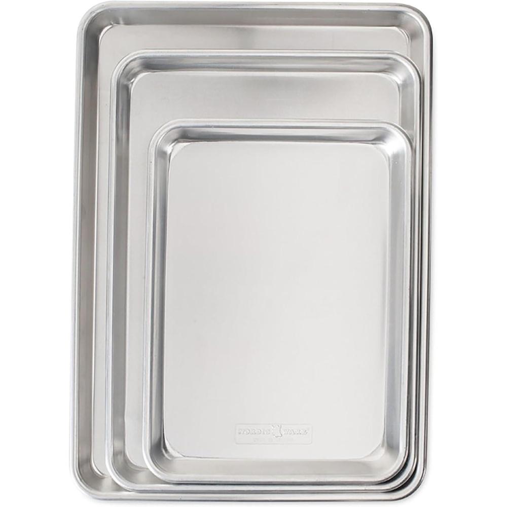 imageNordic Ware Naturals 3 Piece Set USA Made Aluminum Commercial Quality Sheet Pan for Baking or Roasting Encapsulated Galvanized Steel Rim Prevents Warping Half Sheet Jelly Roll and Quarter Sheet3Piece Pan Set