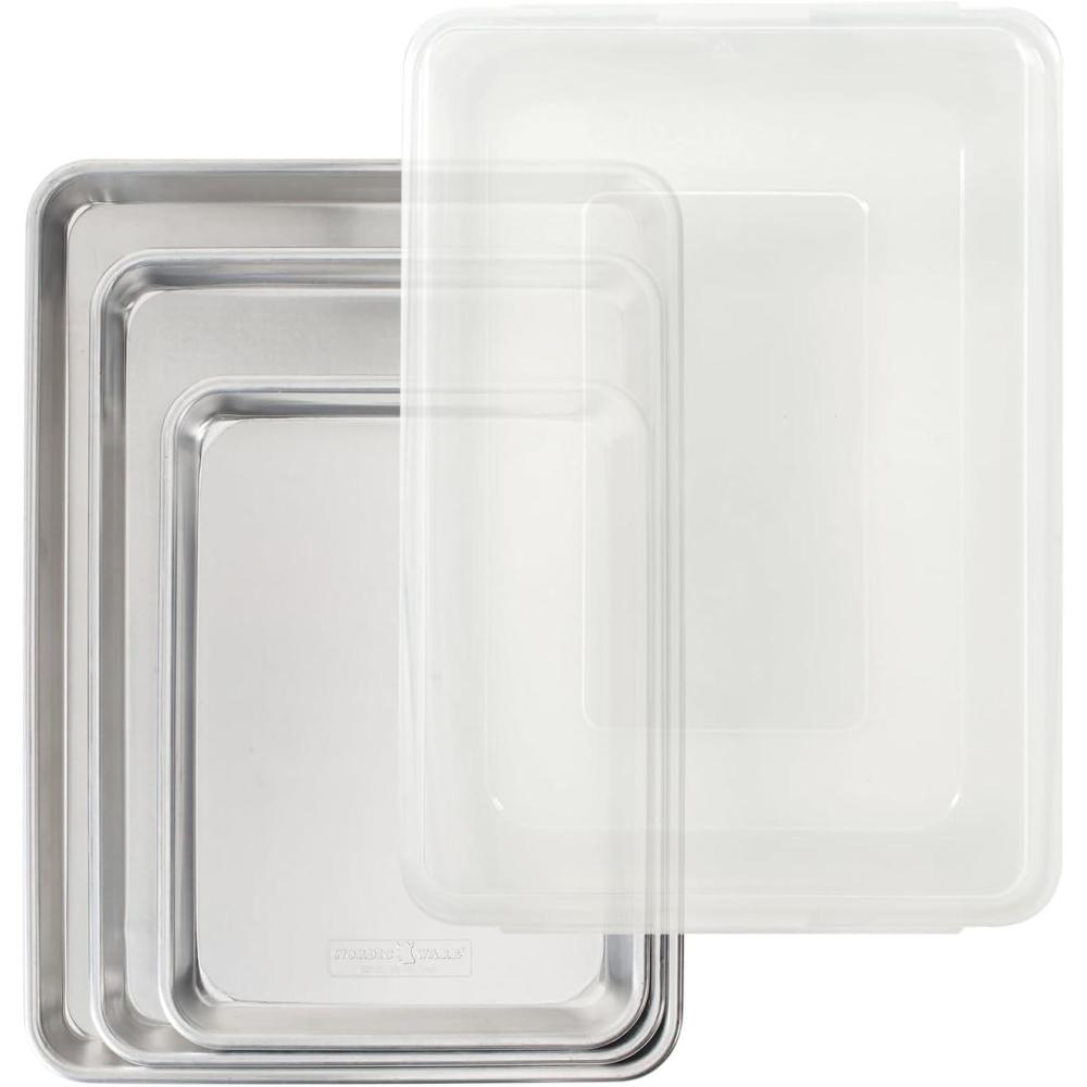 imageNordic Ware Naturals 4 Piece Set USA Made Aluminum Commercial Quality Pans for Baking or Roasting Encapsulated Galvanized Steel Rim Prevents Warping Quarter Sheet Jelly Roll Half Sheet with Lid