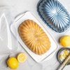 Nordic Ware Formed Fluted Loaf with Keeper Set, Clear Lid and White Base